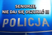 zdjęcie maski policyjnego radiowozu z oznakowaniem policja i graficzny napis seniorze nie daj się oszukać