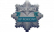 gwiazda, odznaka policyjna z napisem w górnej części policja a poniżej kp rokiciny