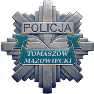 policyjna gwiazda z napisami Policja i Tomaszów Mazowiecki