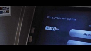 ekran bankomatu z wpisaną kwotą do wypłaty w wysokości 50000 złotych