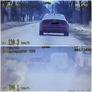 zrzut obrazu z ekranu wideorejestratora. widoczne auto oraz parametry cyfrowy prędkości i urządzenia