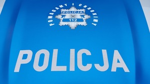 napis pomagamy i chronimy oraz Policja i policyjna gwiazda