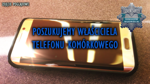 zdjęcie telefonu komórkowego z napisem w kolorze niebieskim o treści poszukujemy właściciela telefonu komórkowego