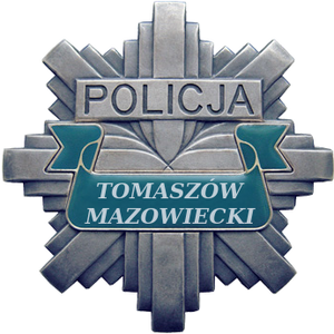 policyjna gwiazda z napisami Policja i Tomaszów Mazowiecki