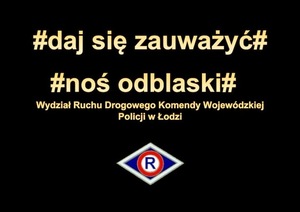 napisy na czarnym tle daj się zauważyć, noś odblaski, oraz logo ruchu drogowego i napis Wydział Ruchu Drogowego Komendy Wojewódzkiej Policji w Łodzi