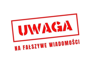 grafika z napisem uwaga fałszywe wiadomości