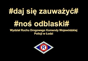 Czarne tło z napisem #daj się zauważyć noś odblaski.