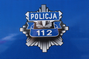 Policyjna gwiazda z numerem 112.